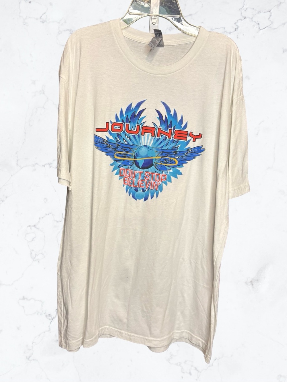 Next Level Apparel Cream Short Sleeve Tee with Blue and Red Journey Graphic